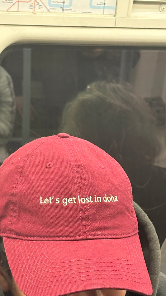 Lets get lost in doha cap