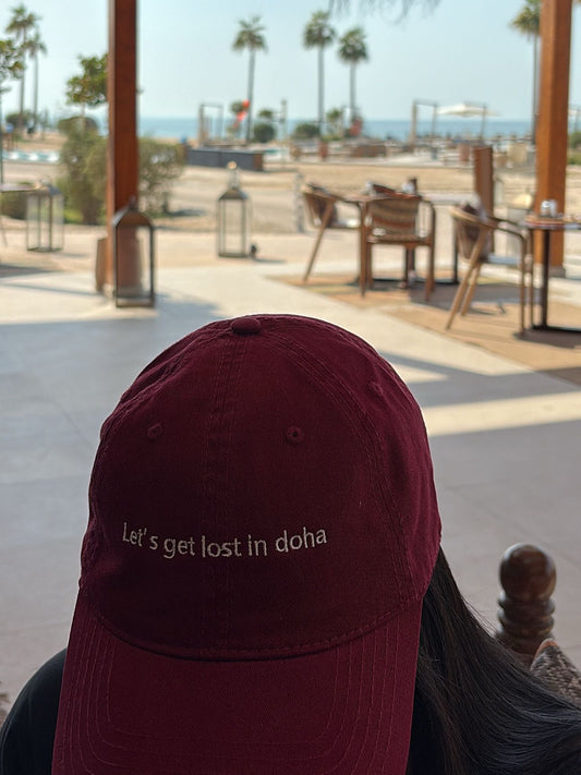 Lets get lost in doha cap